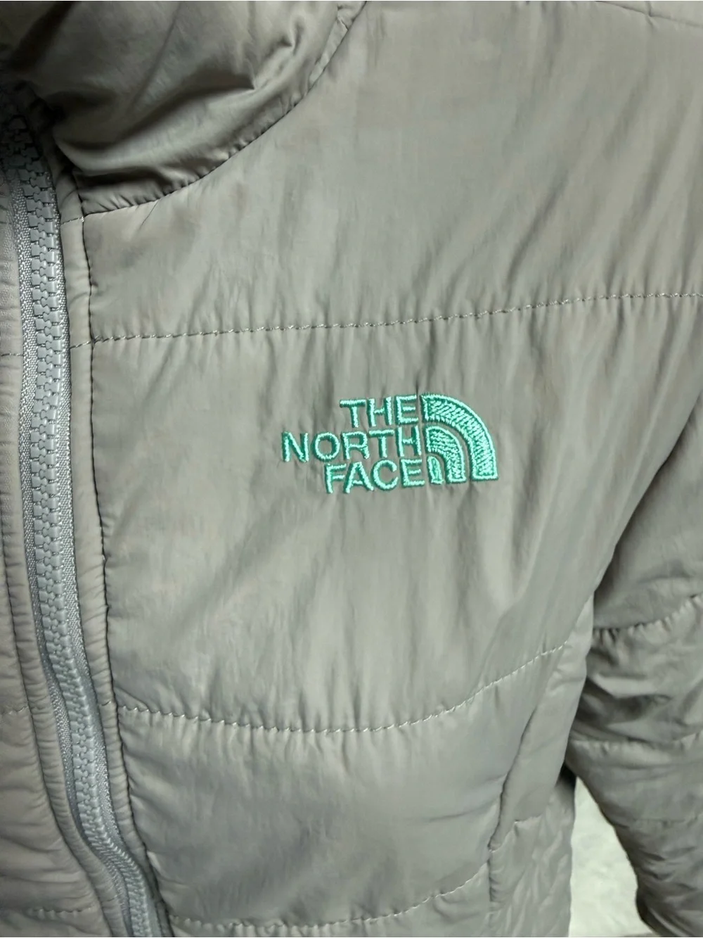 The North Face girls Grey Quilted Insulated Jacket